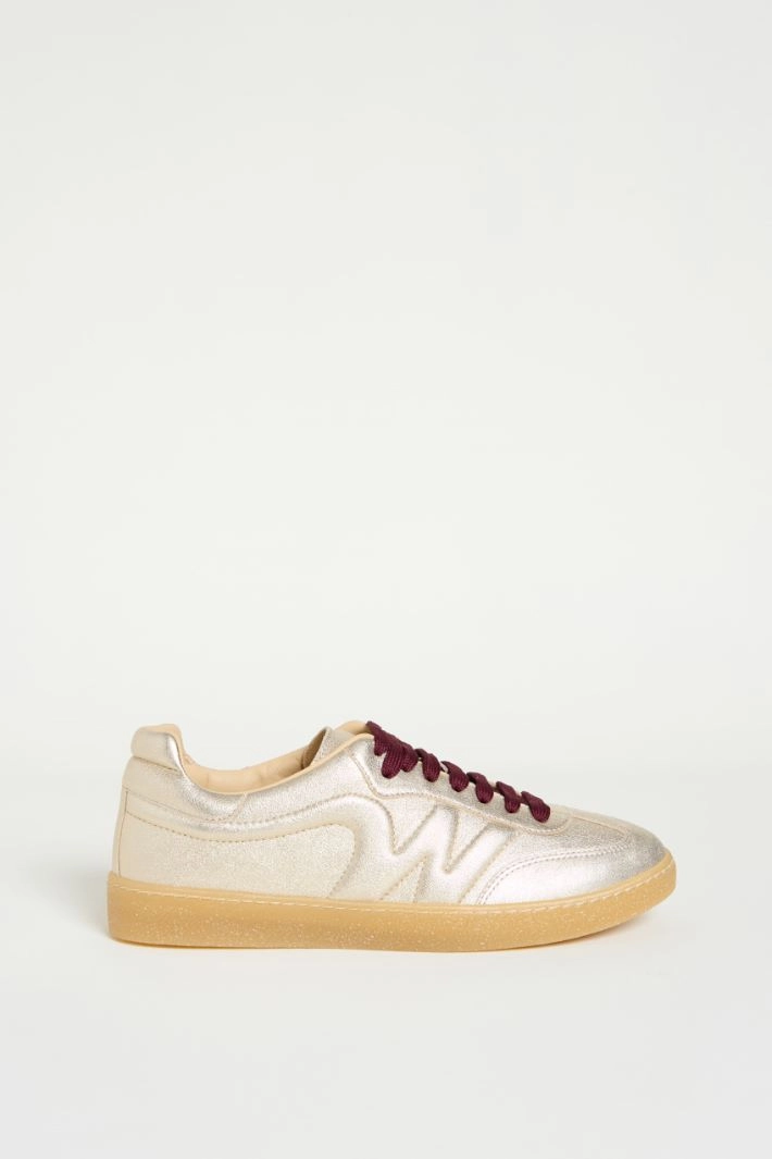 Laminated nappa sneakers - GOLD