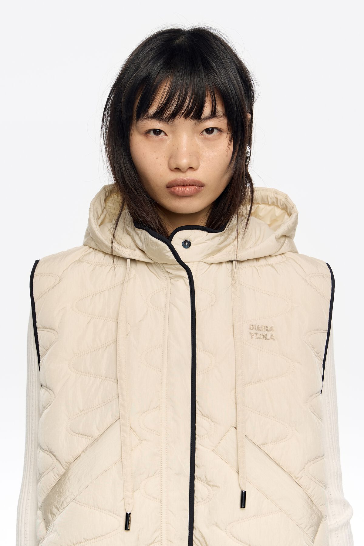 Ivory padded vest hood