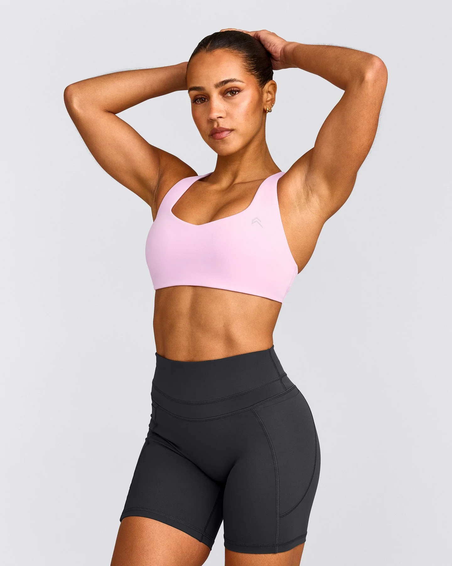 EasyLift™ Cross Back Sports Bra with Grey Logo | Chalk Pink