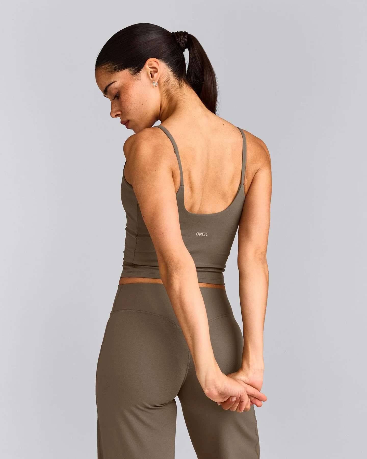 SoftMotion™ Strappy Mid Vest with Built in Bra Shelf with Grey Logo | Moss Brown