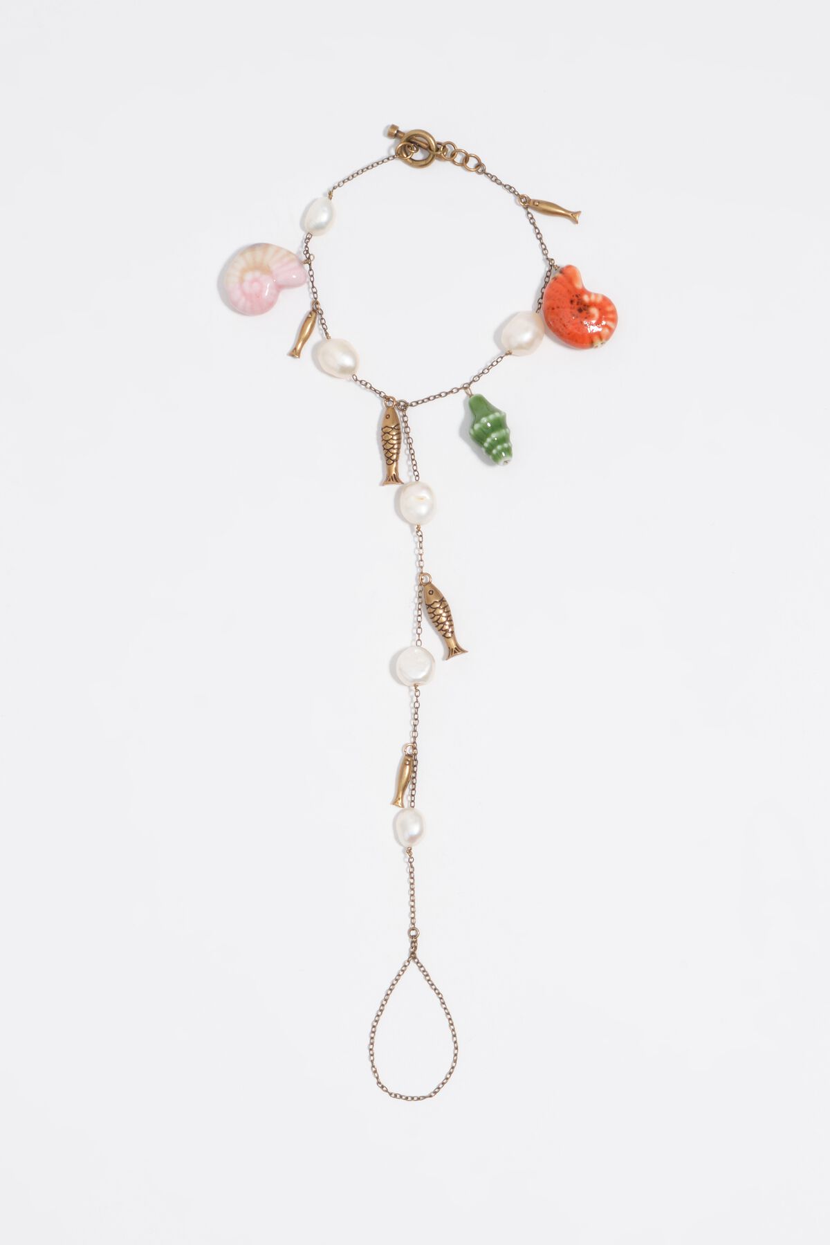 Aged gold anklet with pearls, shells and fish