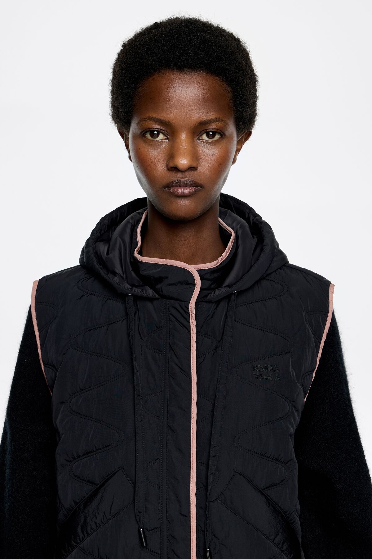 Black padded vest hood