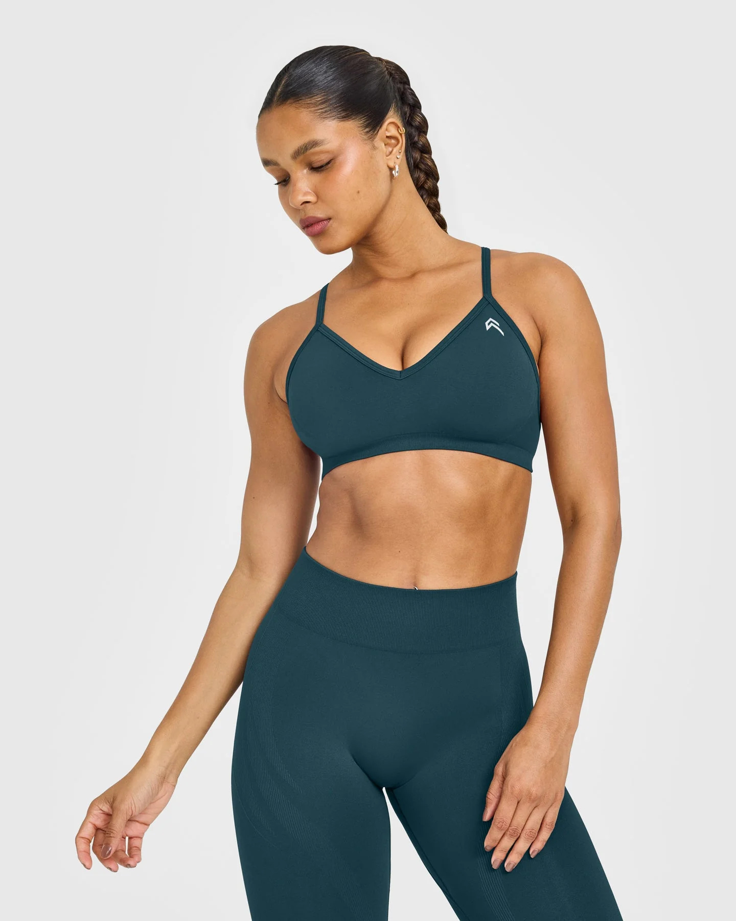 EnhanceLift™ Seamless Strappy Sports Bra with White Logo | Washed Oil Blue
