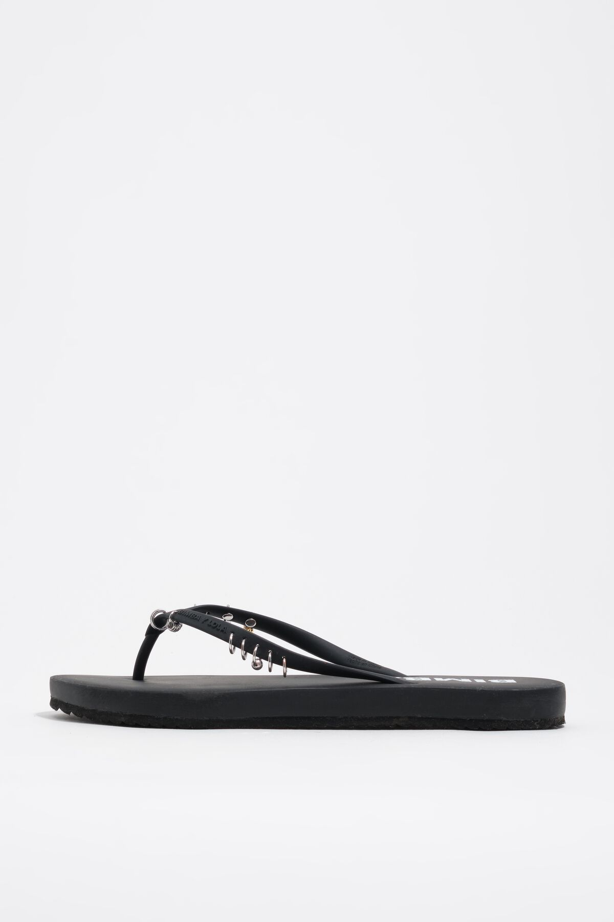 Black flip-flop with piercings