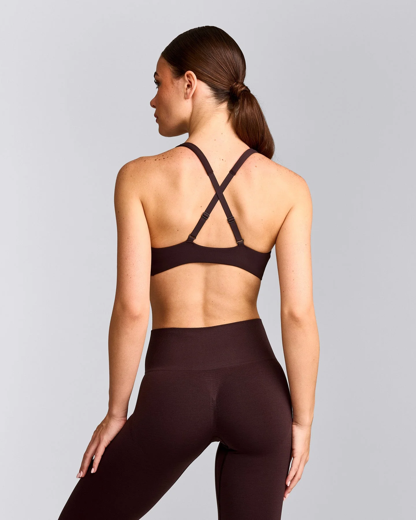 EasyLift™ Cross Back Sports Bra with Grey Logo | Plum Brown