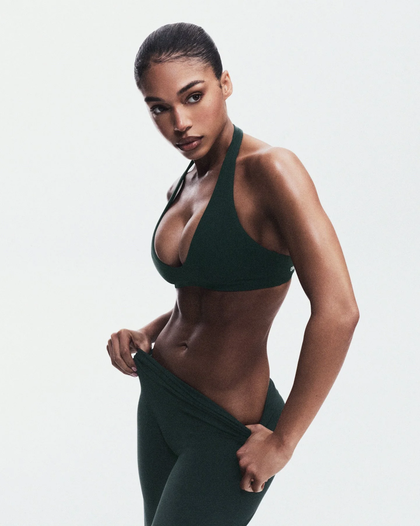 SoftMotion™ Minimal Halter Neck Bralette with Grey Logo | Emerald Noir