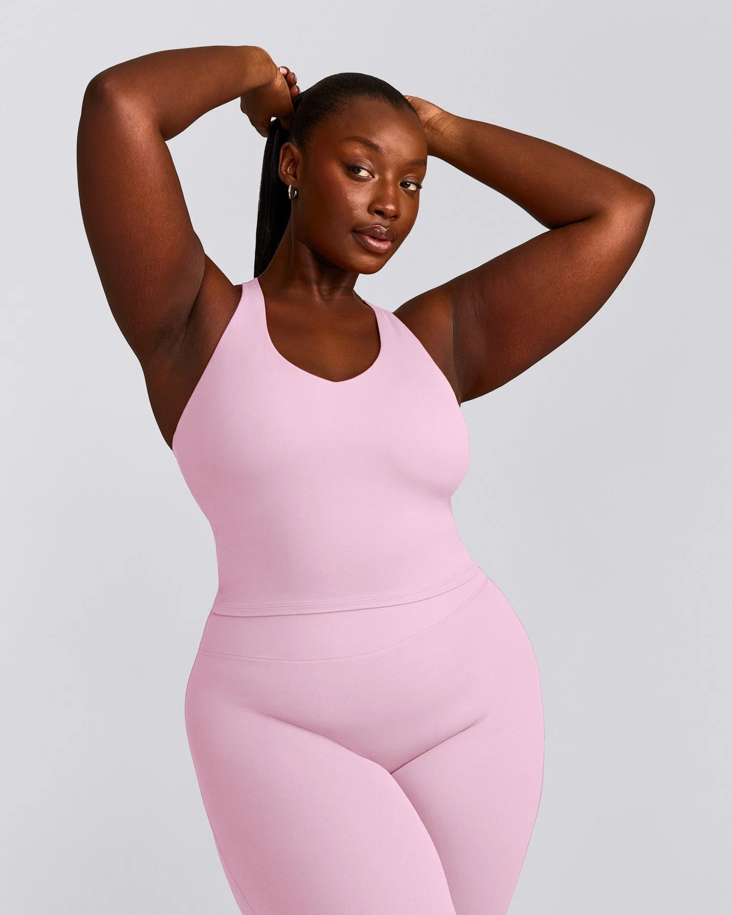 SoftMotion™ Racer Back Mid Vest with Built in Bra Shelf with Grey Logo | Chalk Pink