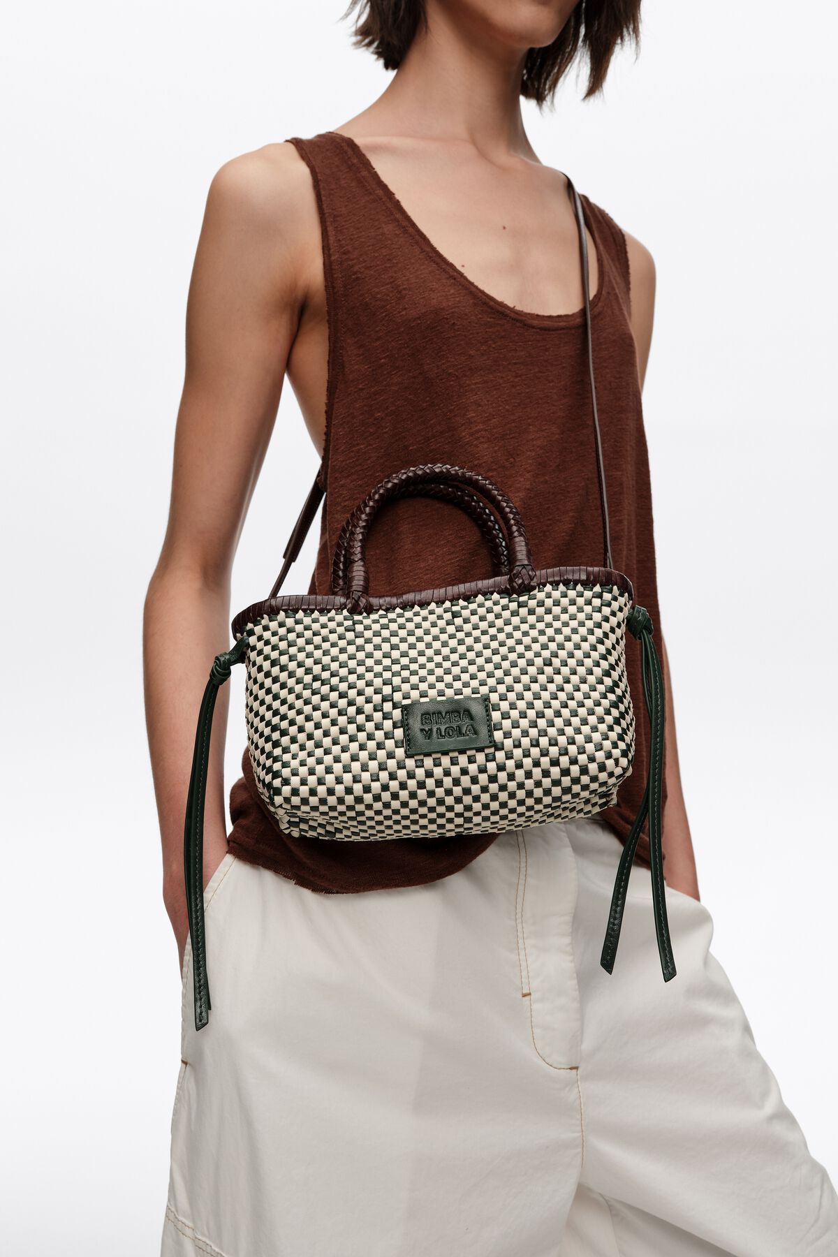 Dark green mini plaited leather bag