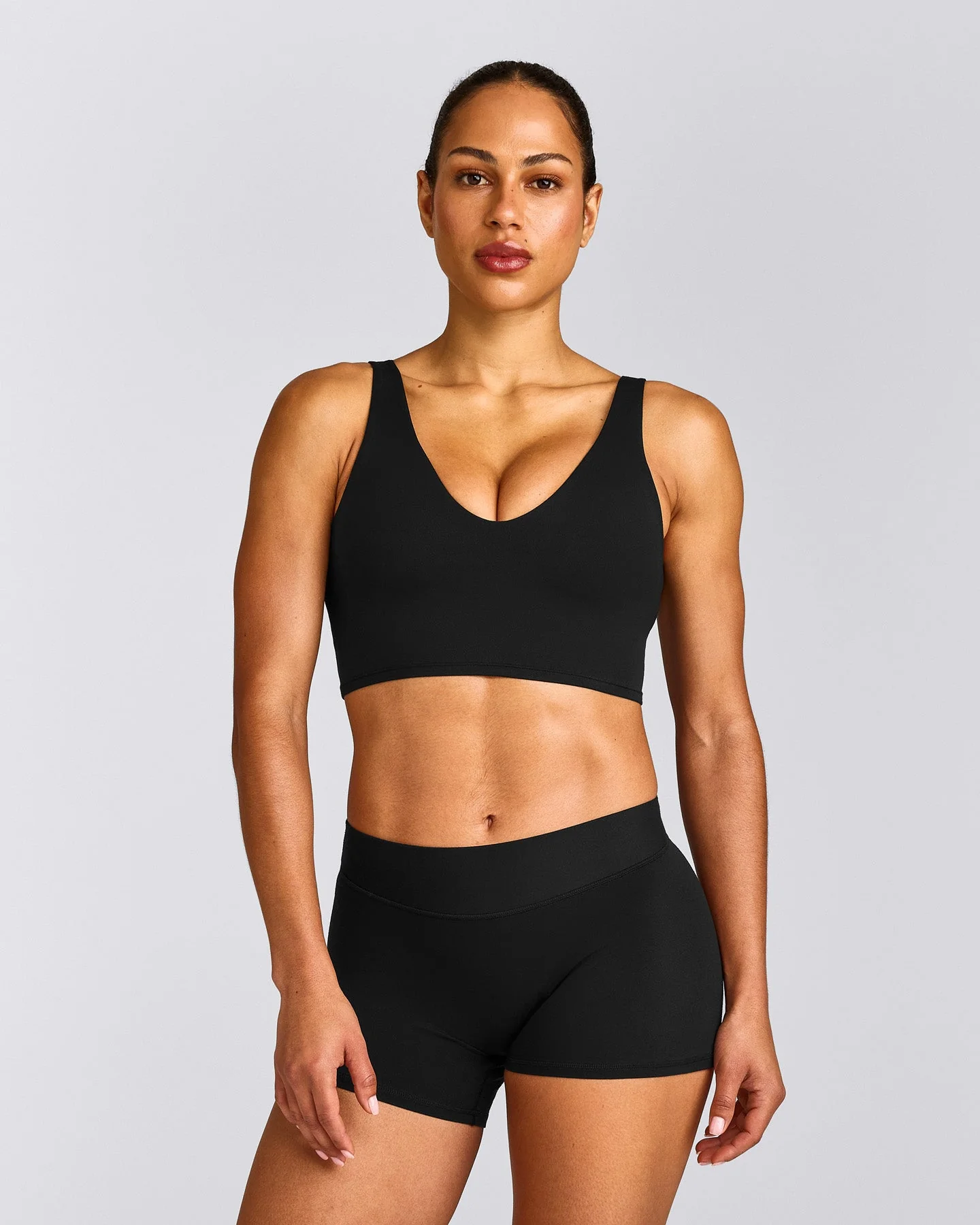 SoftMotion™ Longline Sports Bra with Grey Logo | Black