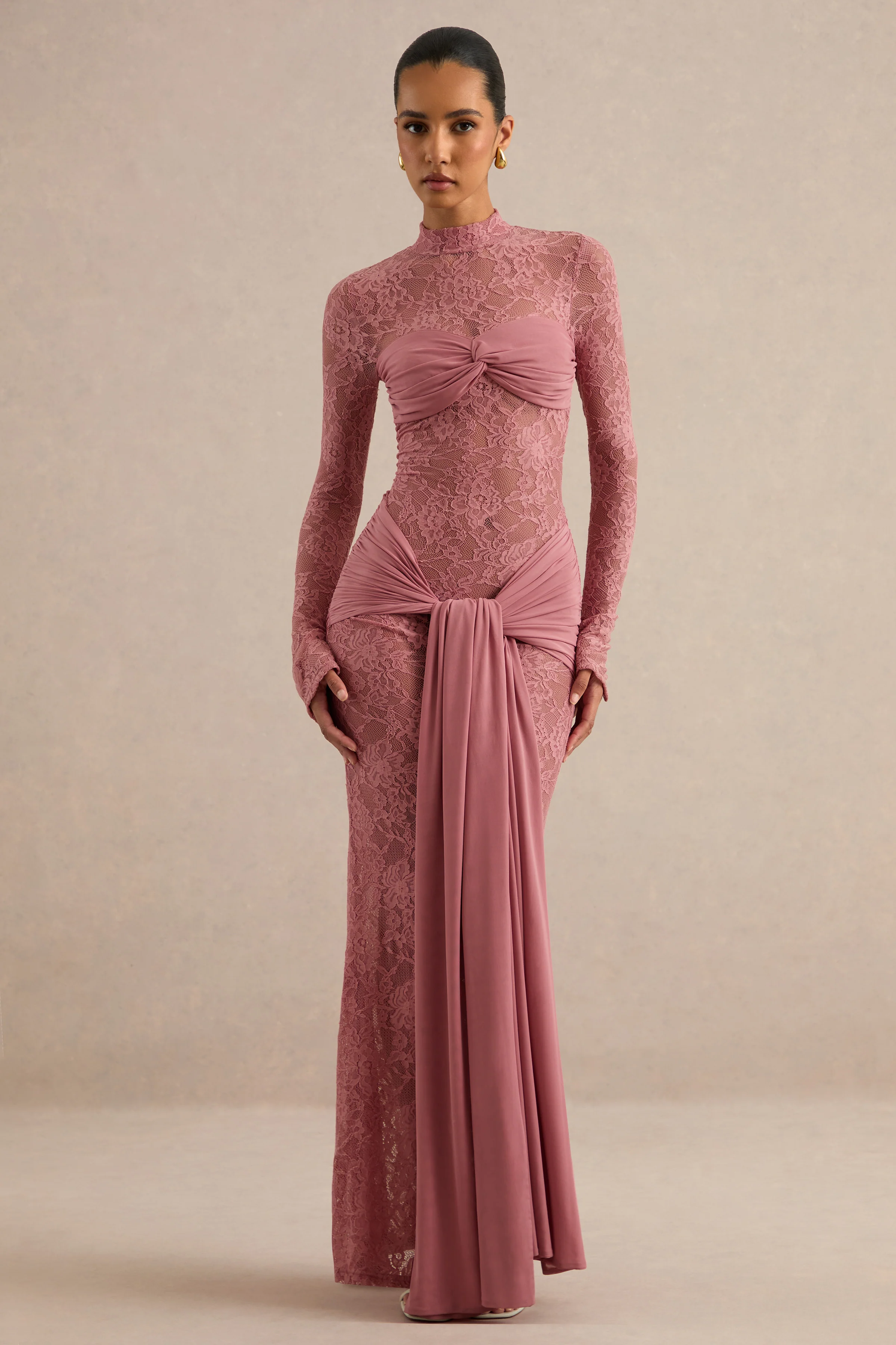 Akira | Blush Sheer Lace High Neck Long Sleeve Maxi Dress With Gathered Detailing And Sash