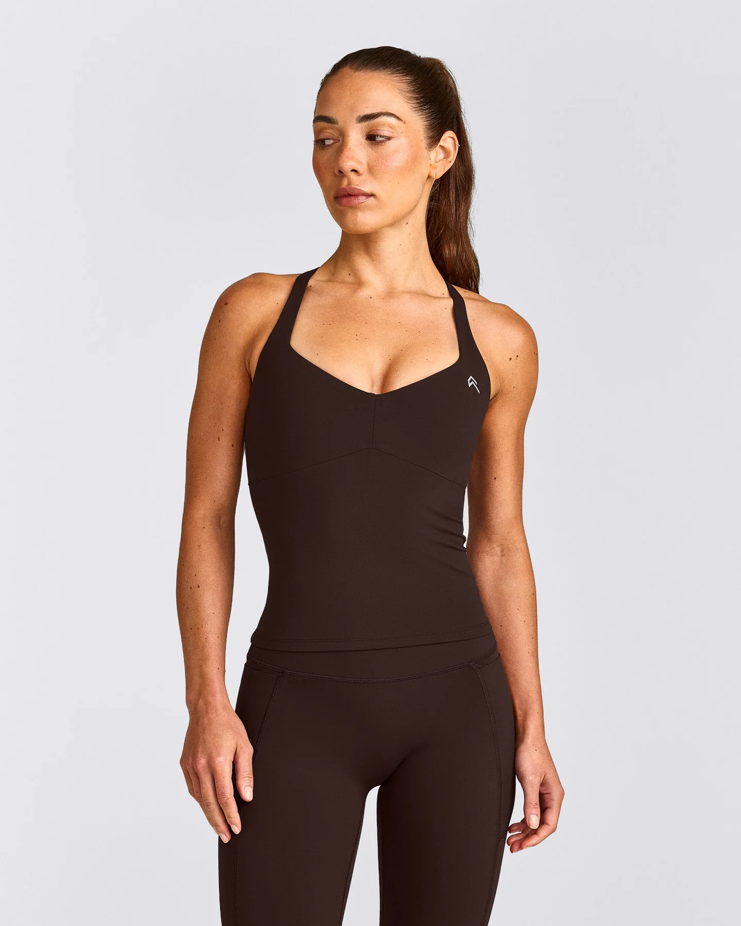 UnifiedMove™ T Back Mid Vest with Built in Bra Shelf with Reflective Logo | 70% Cocoa