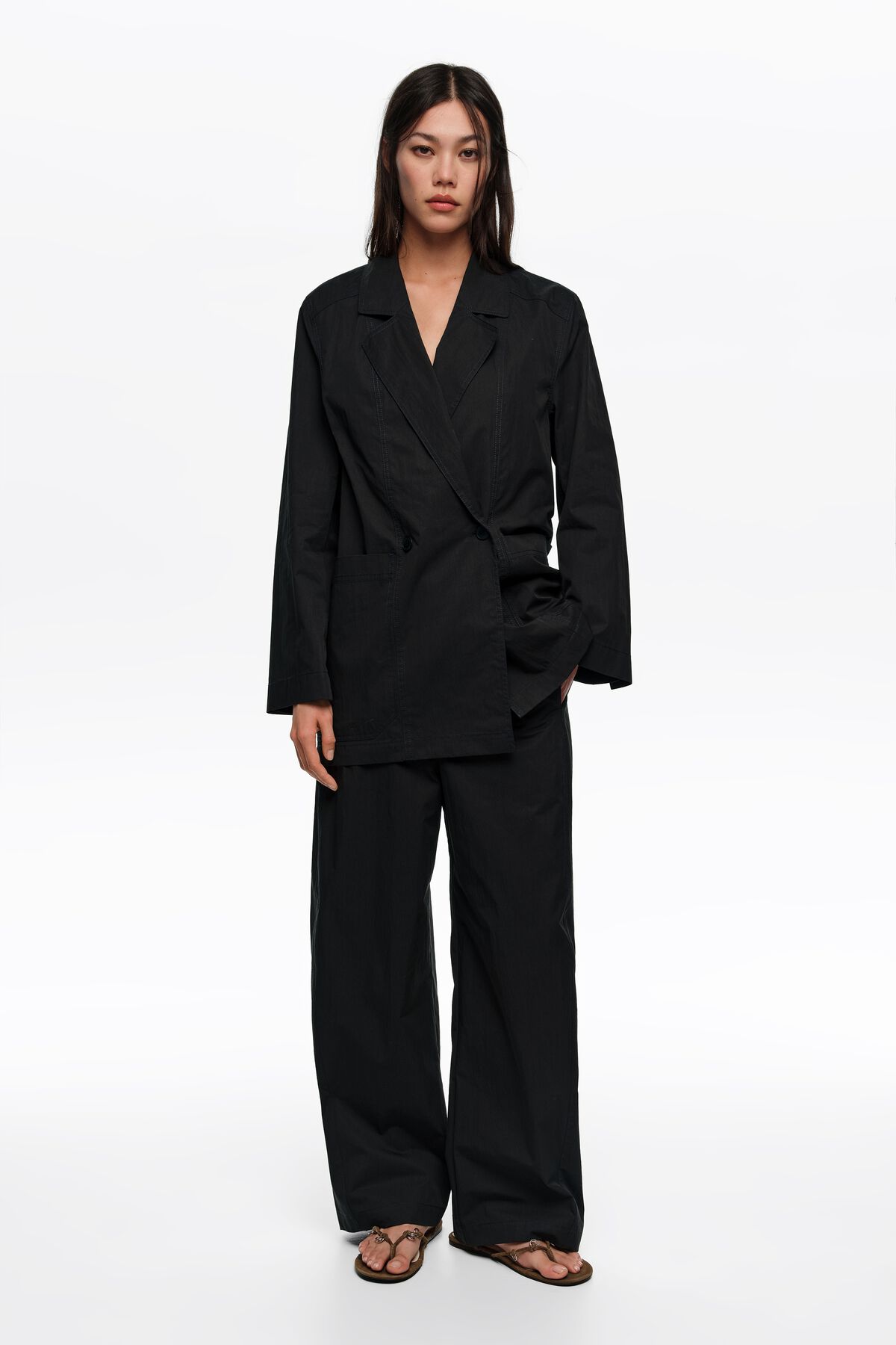 Black barrel trousers with stitching