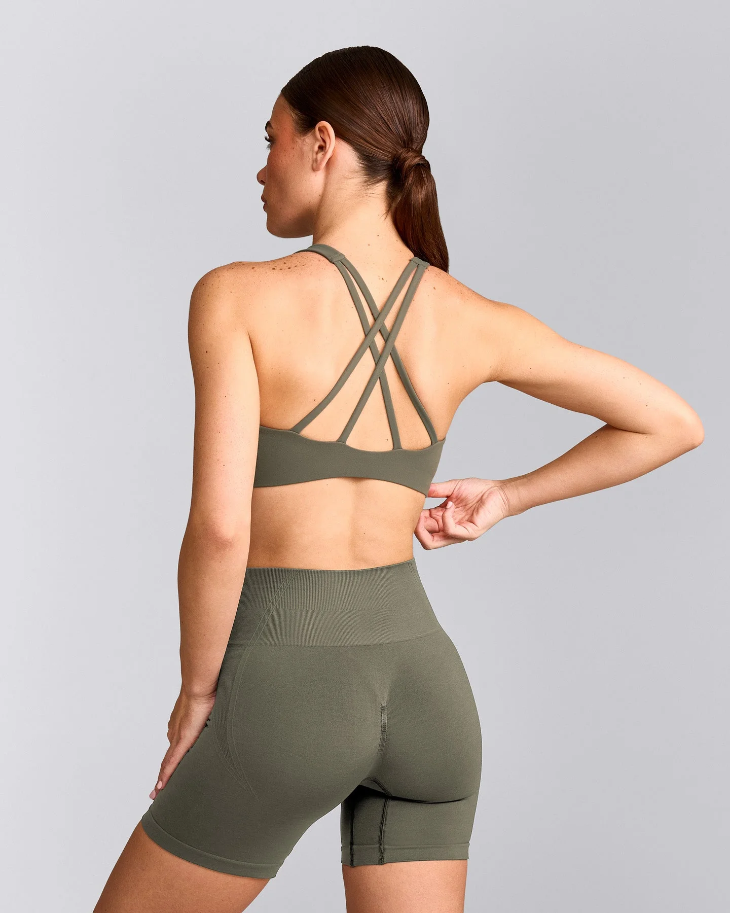 EasyLift™ High Neck Sports Bra with Grey Logo | Alpine Green