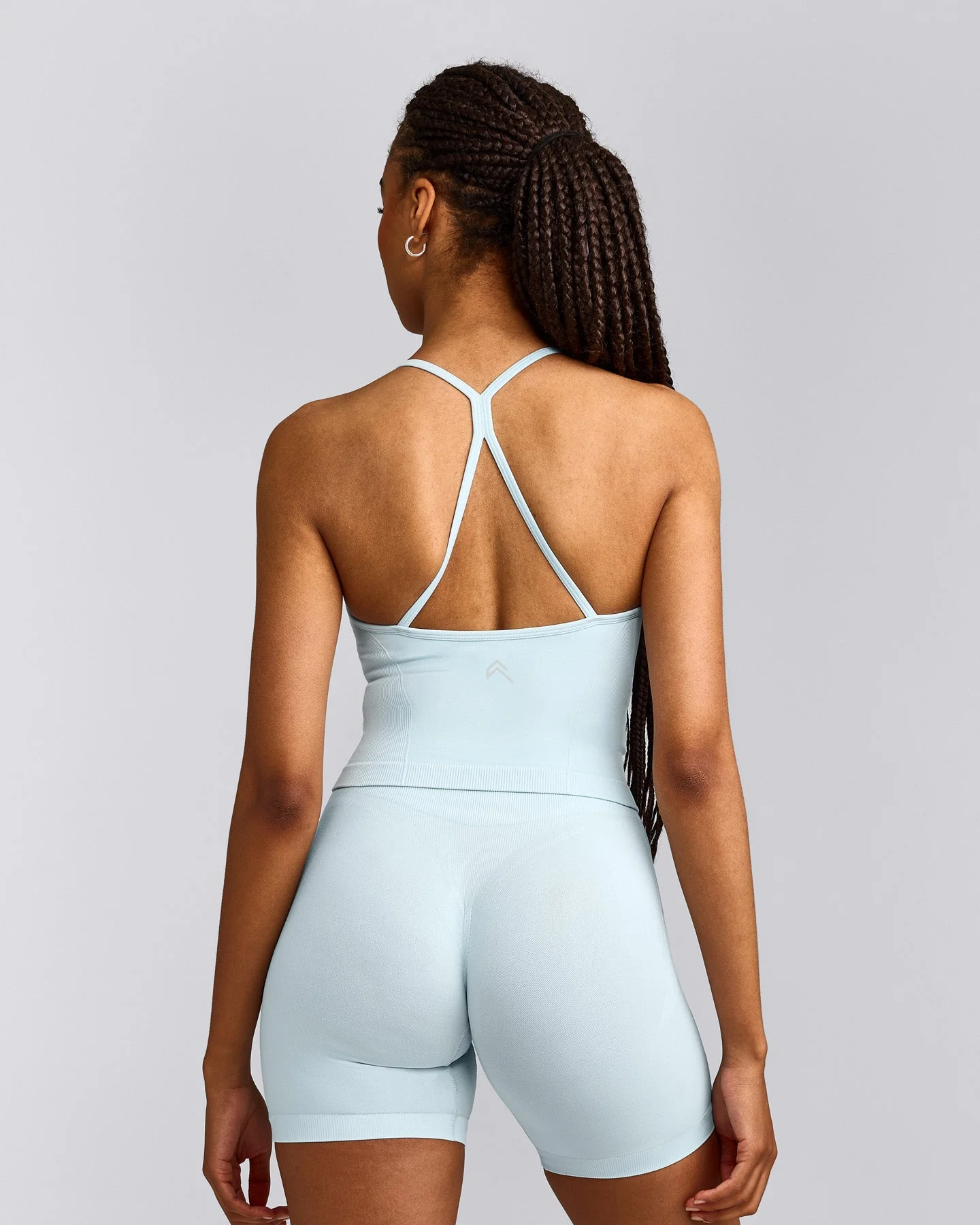 EnhanceLift™ Seamless Strappy Racer Vest with Built in Bra Shelf with Grey Logo | Cloud Blue