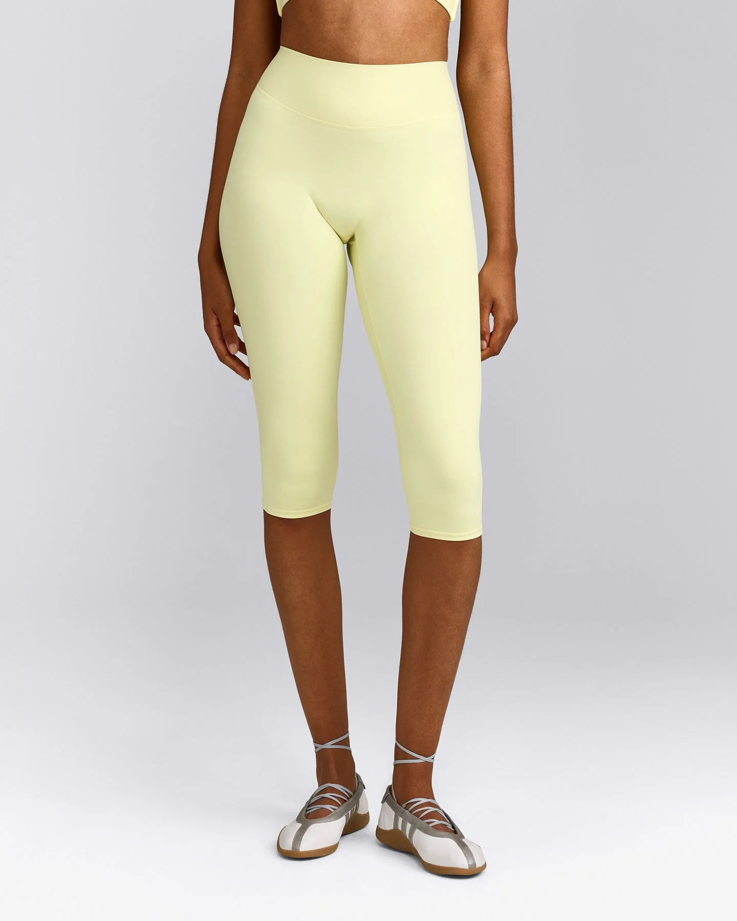 SoftMotion™ High Waisted Capri Leggings with Grey Logo | Pastel Yellow