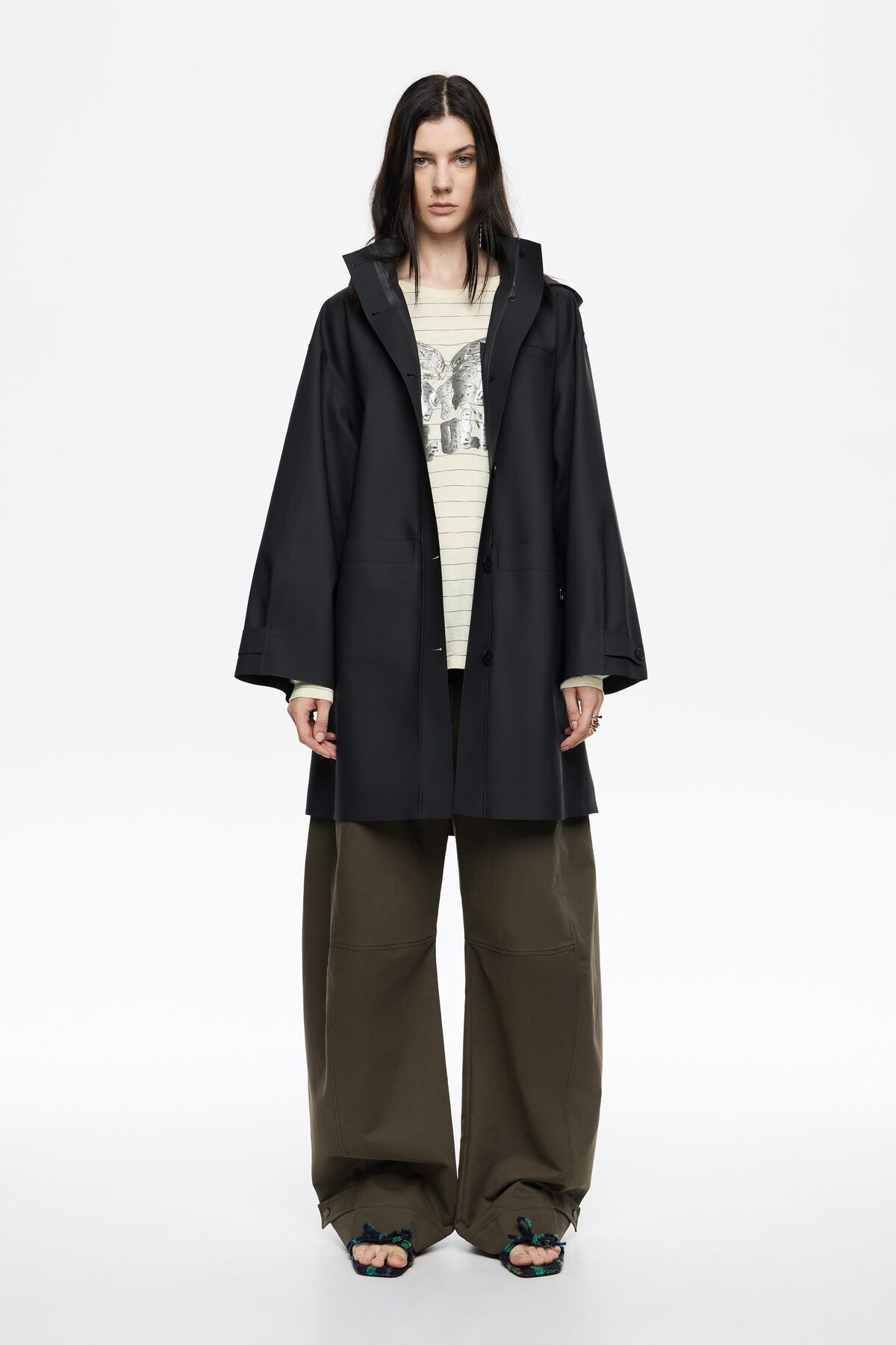 Dark blue rubberized A-line trench