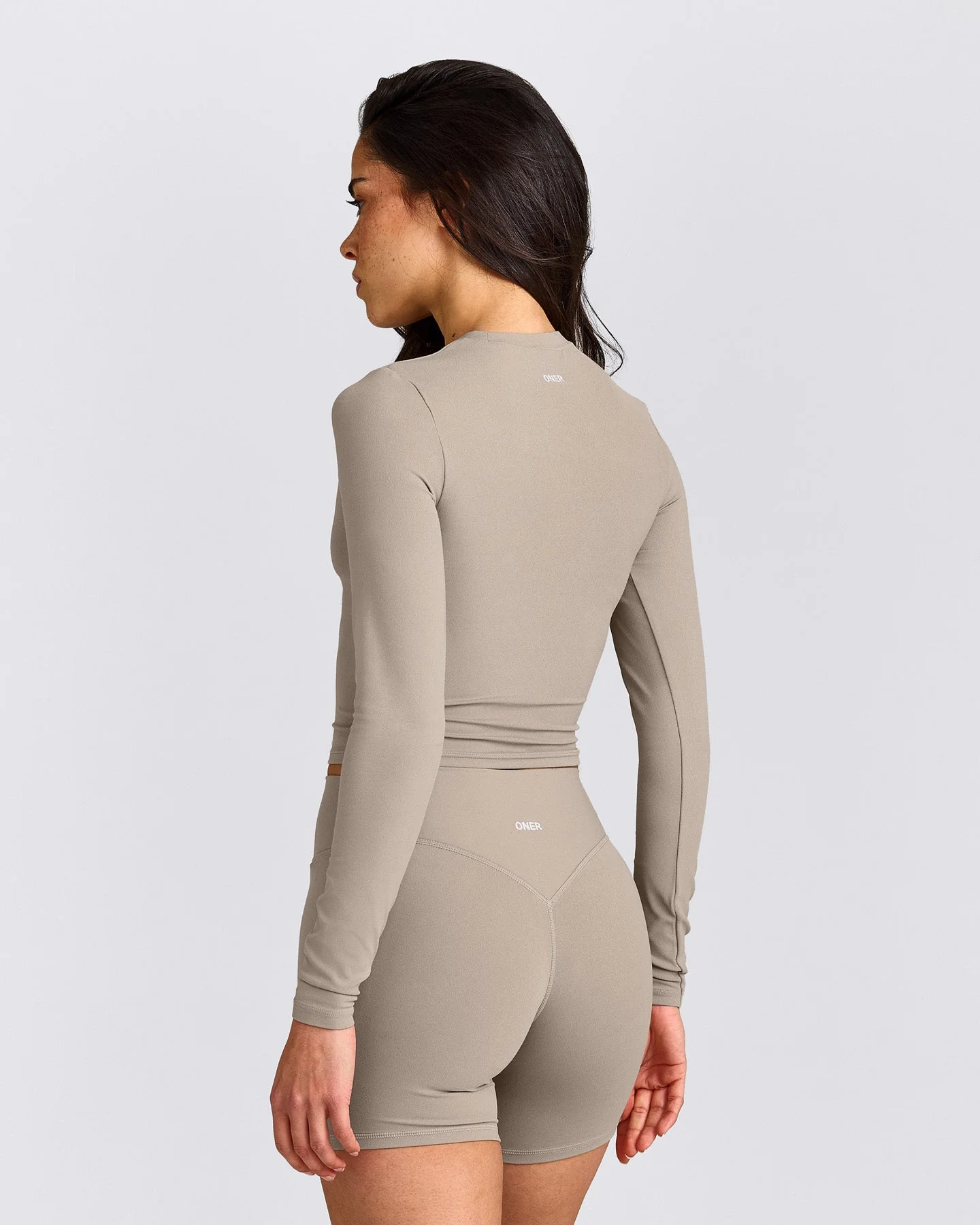 SoftMotion™ Long Sleeve Mid Top with White Logo | Warm Sand