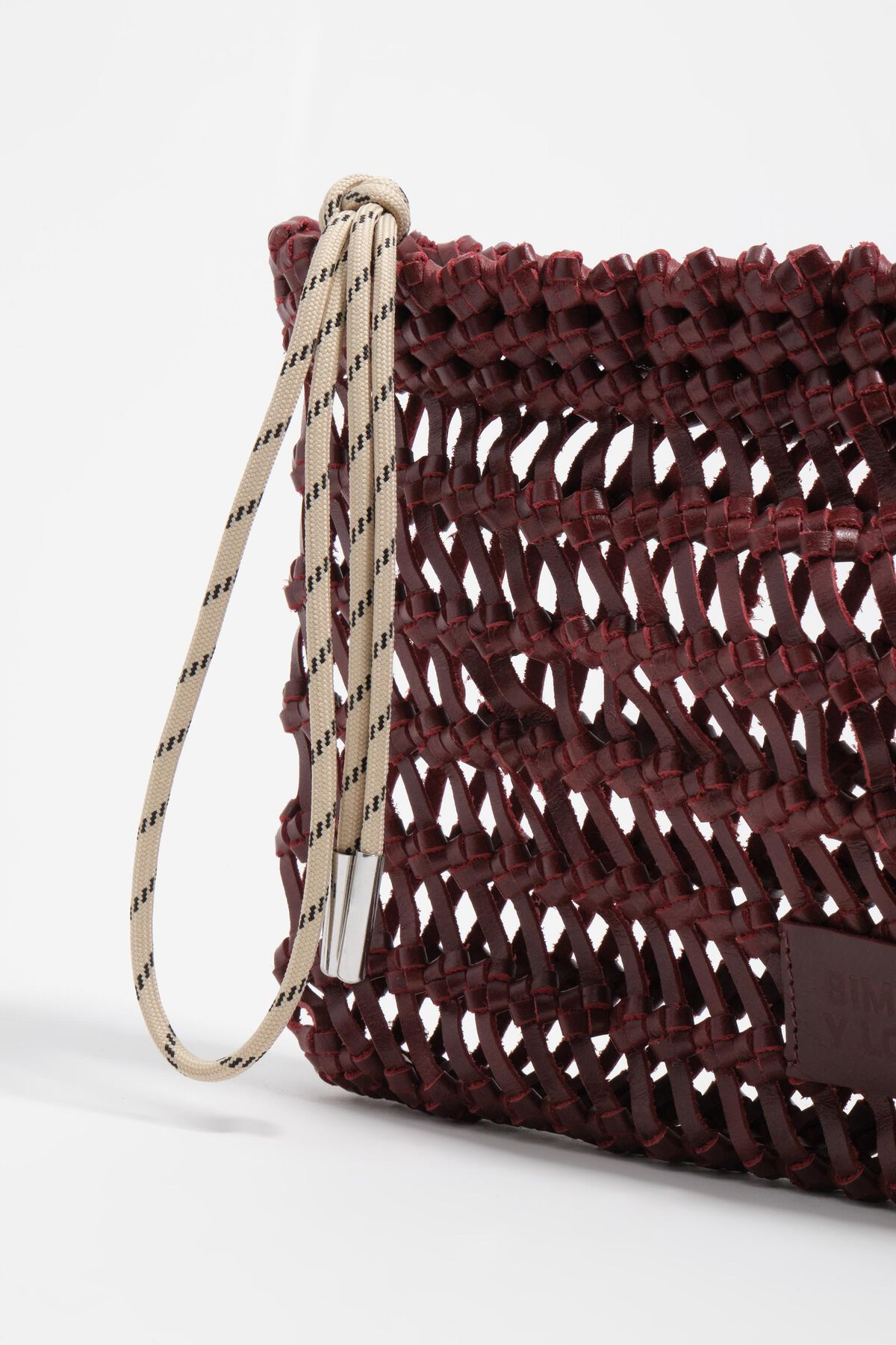 Dark cherry plaited leather handbag