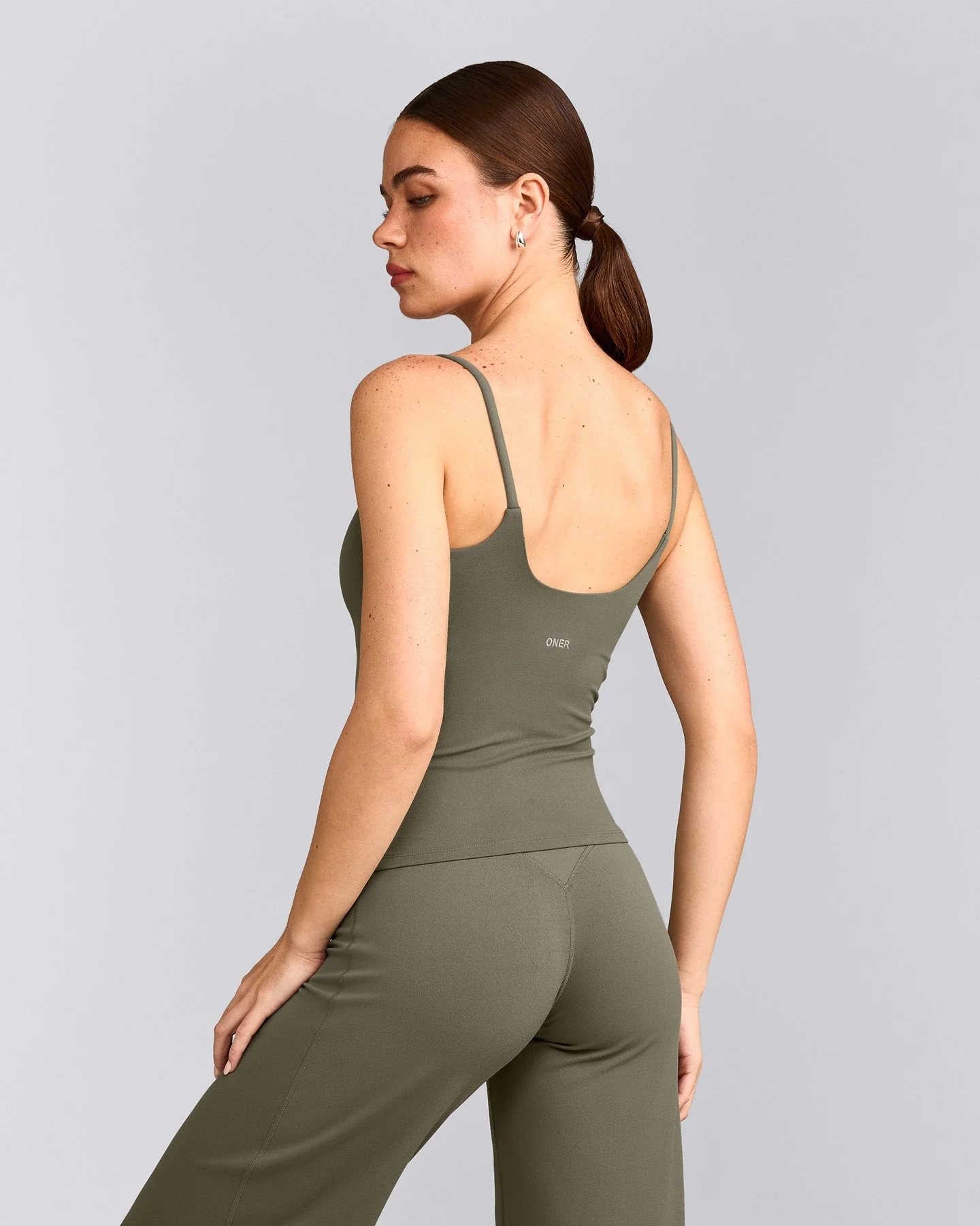 SoftMotion™ Strappy Vest with Built in Bra Shelf with Grey Logo | Alpine Green