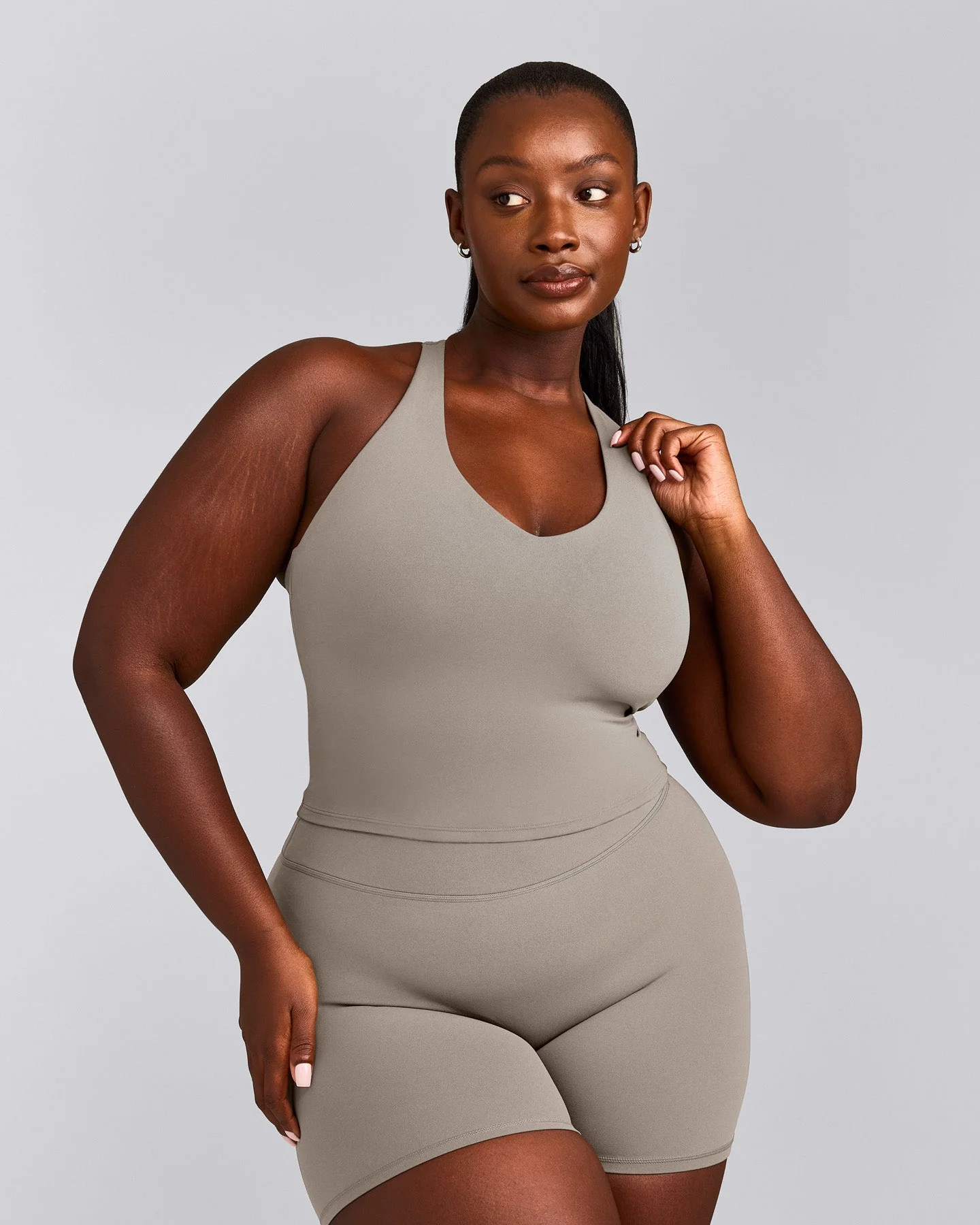 SoftMotion™ Racer Back Mid Vest with Built in Bra Shelf with White Logo | Warm Sand