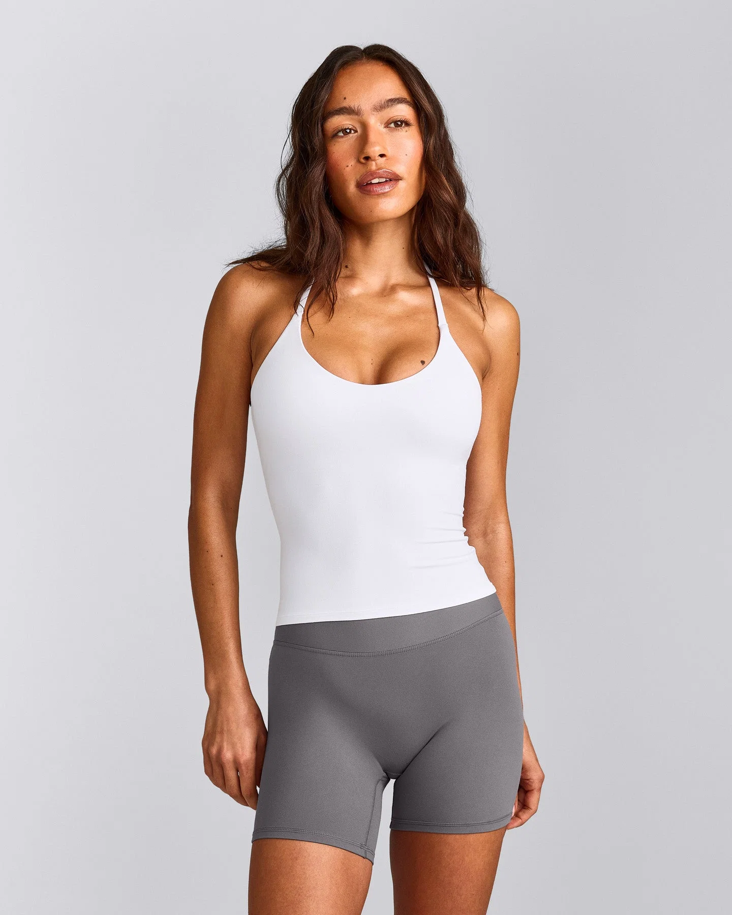 SoftMotion™ Strappy Halter Neck Vest with Built in Bra Shelf with Grey Logo | White