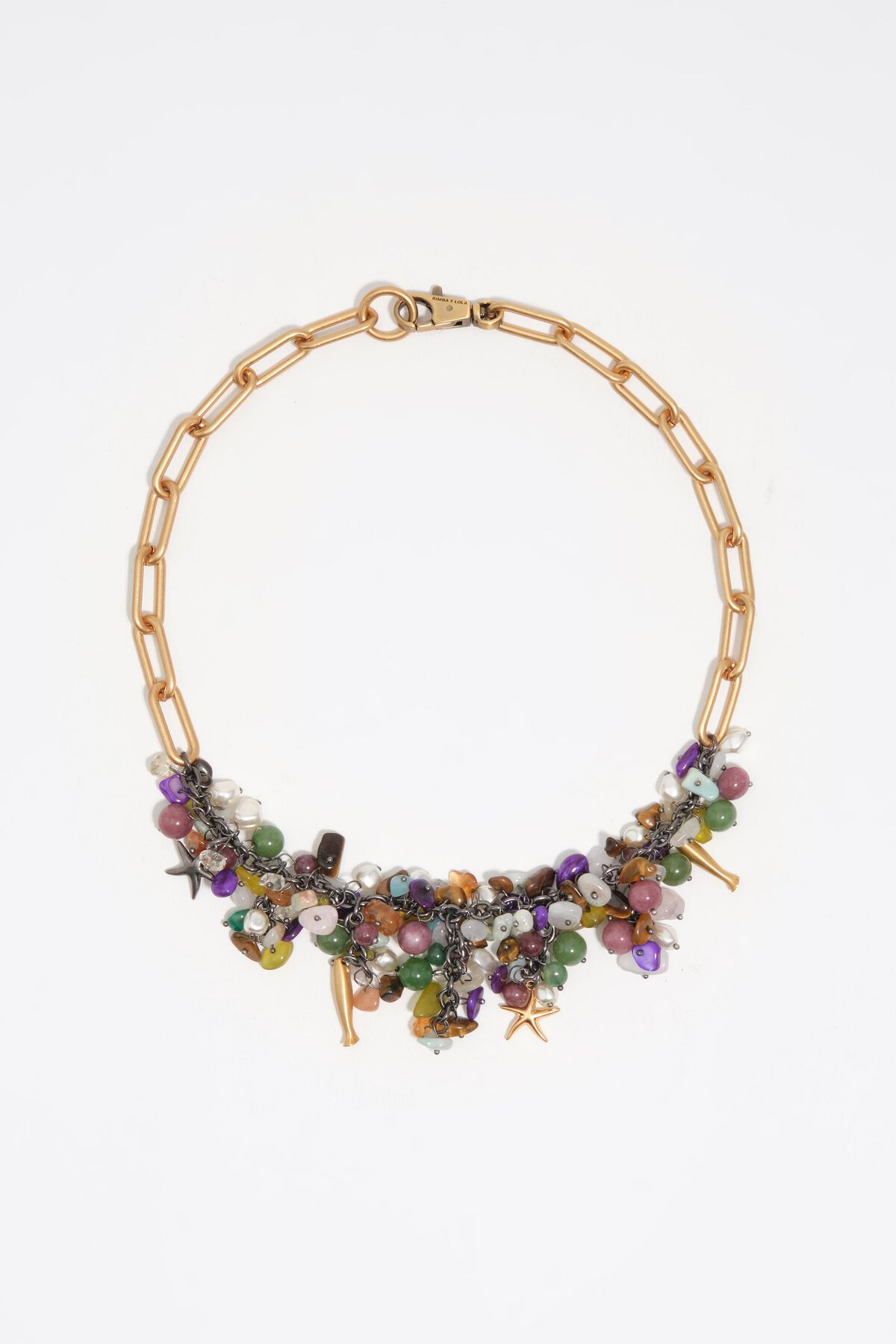 Aged gold necklace with stones and fish