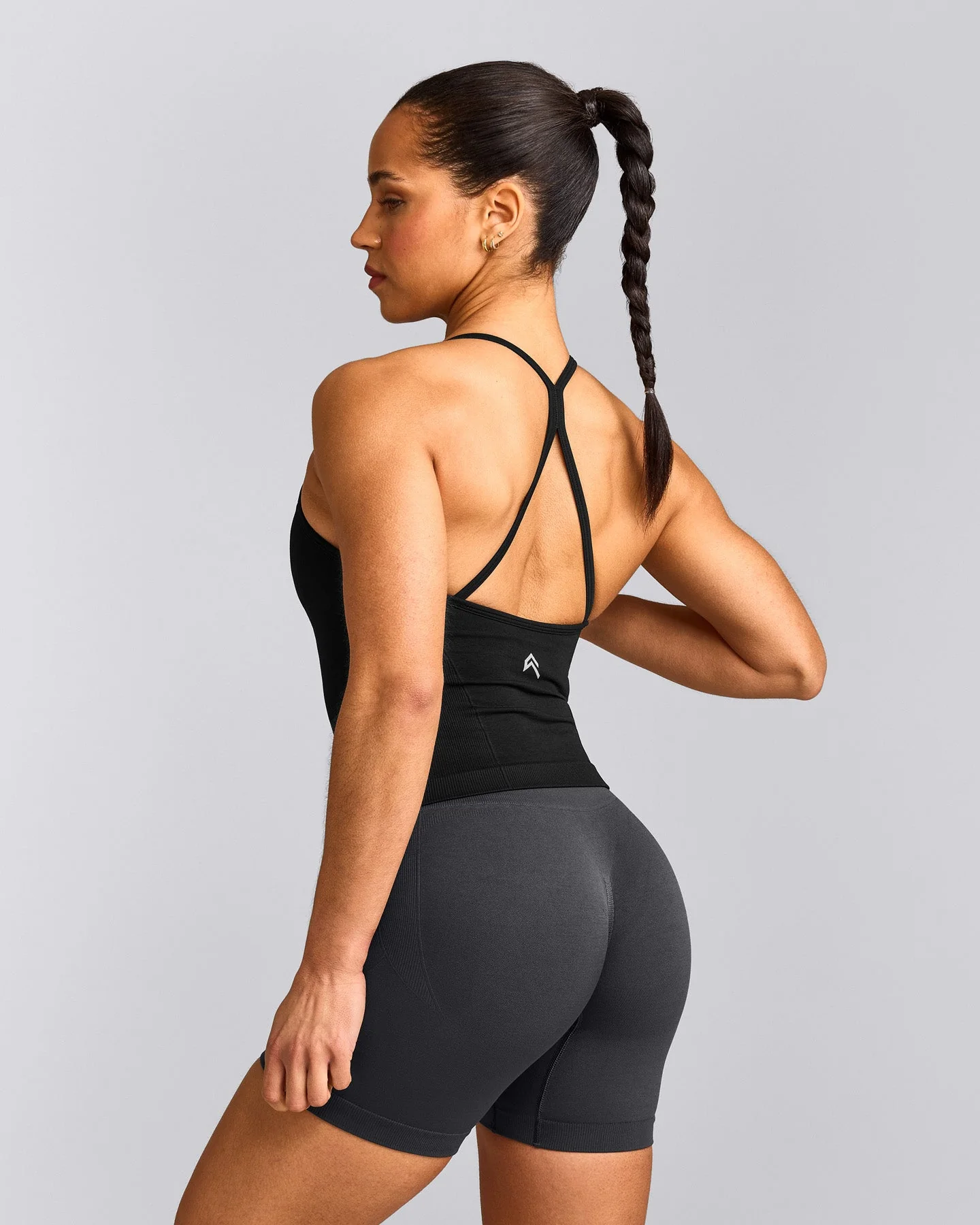 EnhanceLift™ Seamless Strappy Racer Vest with Built in Bra Shelf with Grey Logo | Black