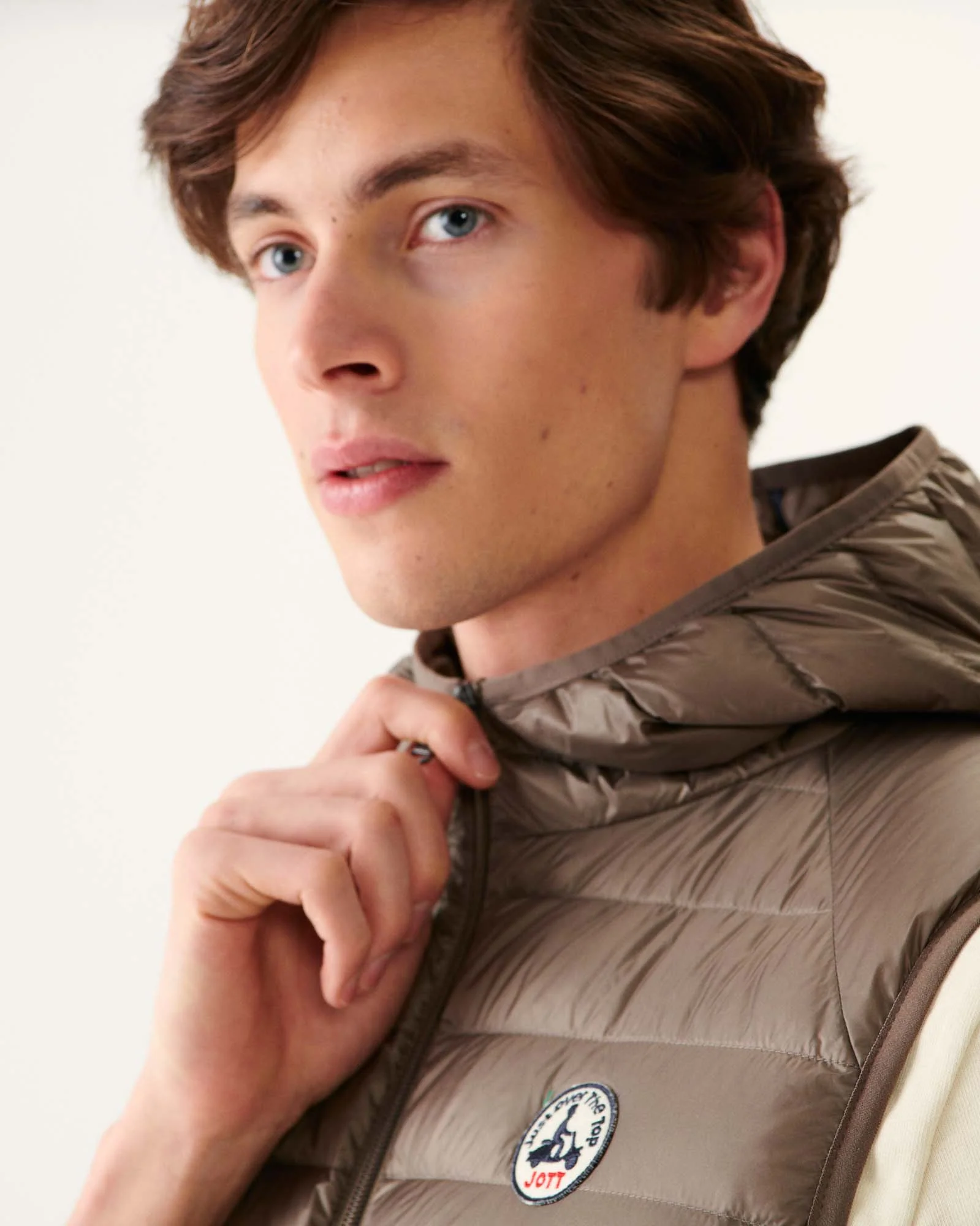 Taupe Pat hooded sleeveless padded jacket