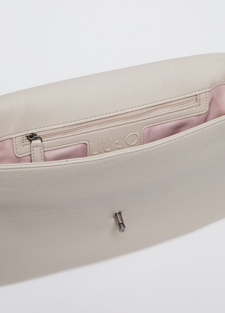 Handbag in coated fabric