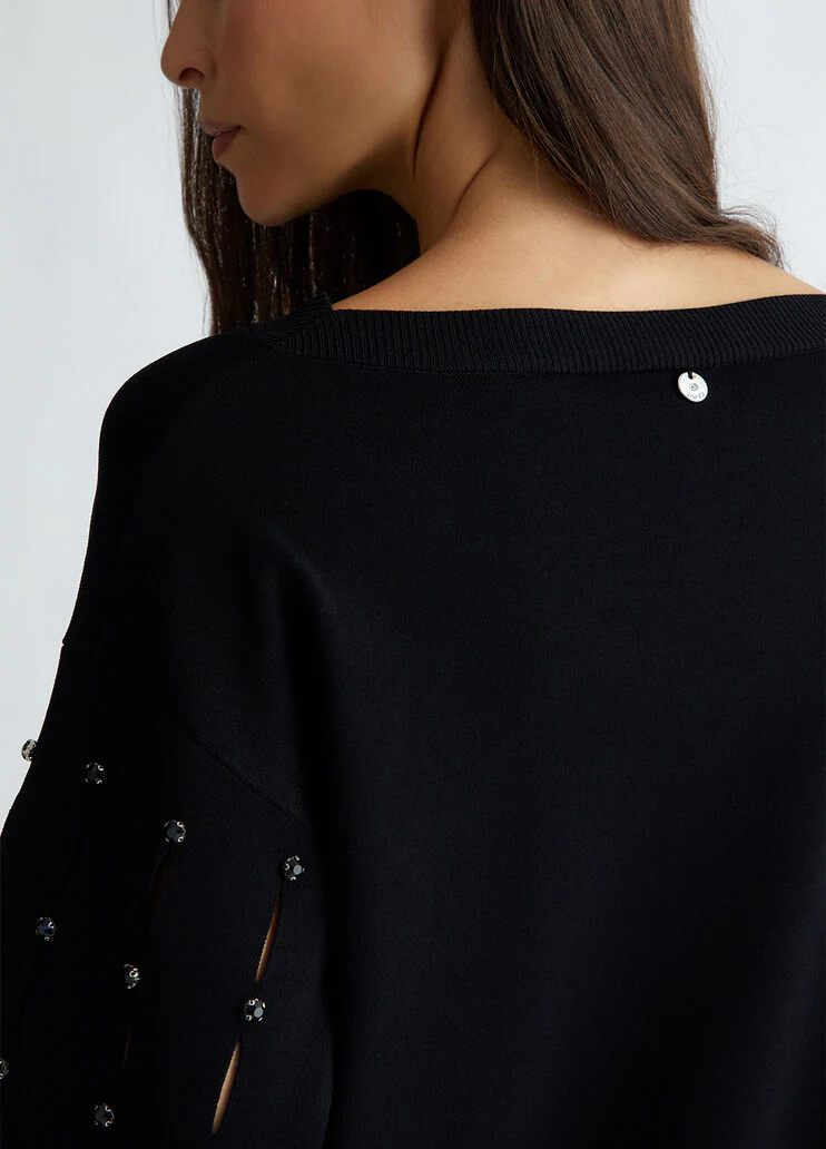 Cut-out sweater with rhinestones