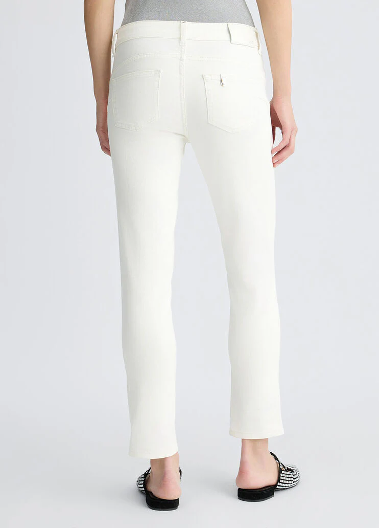 Cropped white trousers with turn-ups