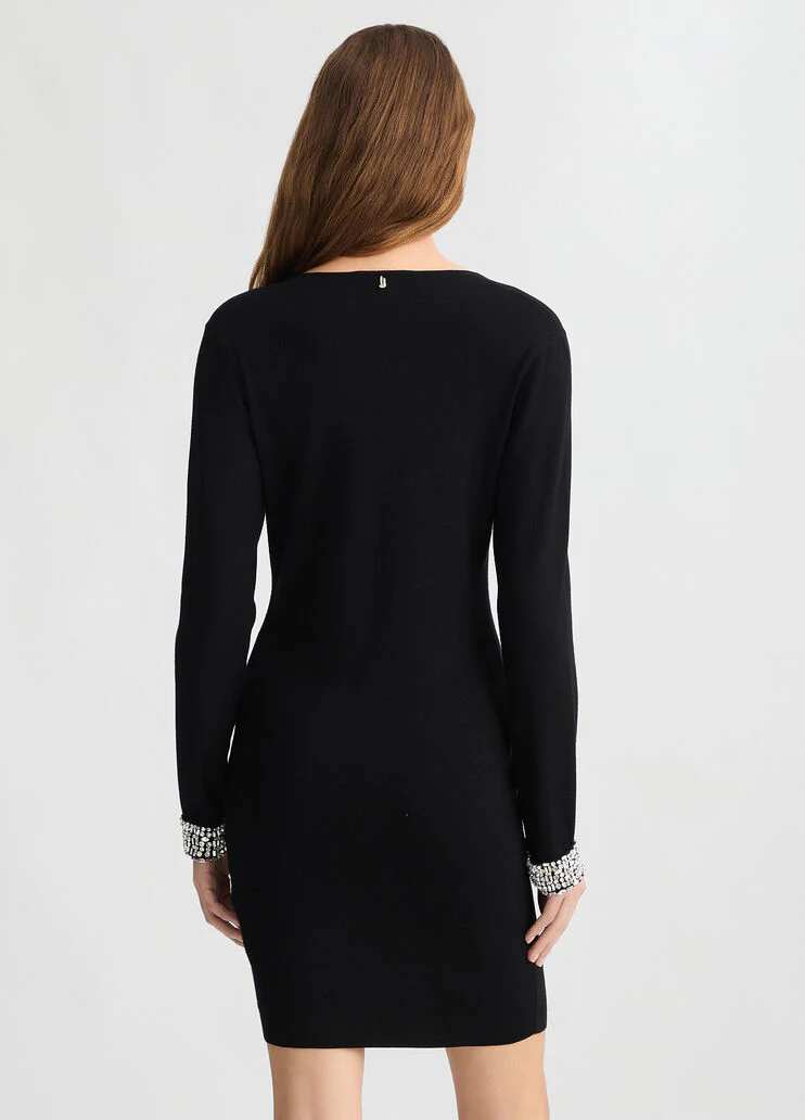 Short black dress with bejewelled embellishment
