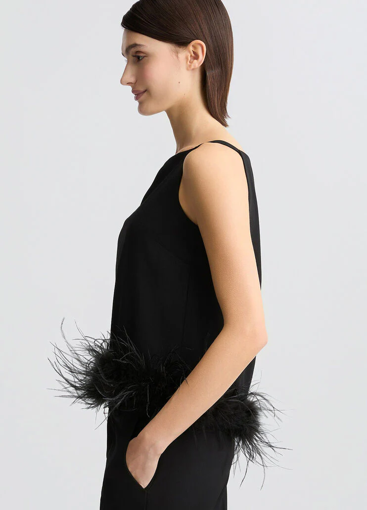 Black top with feathers