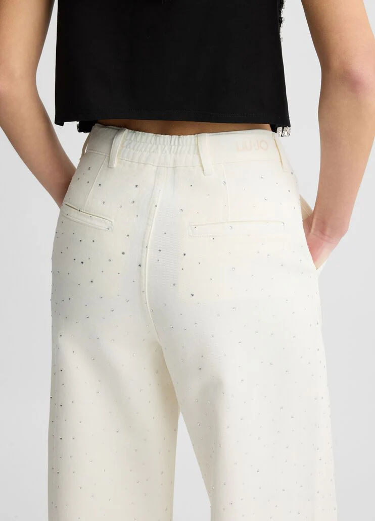 Flared jeans with rhinestones