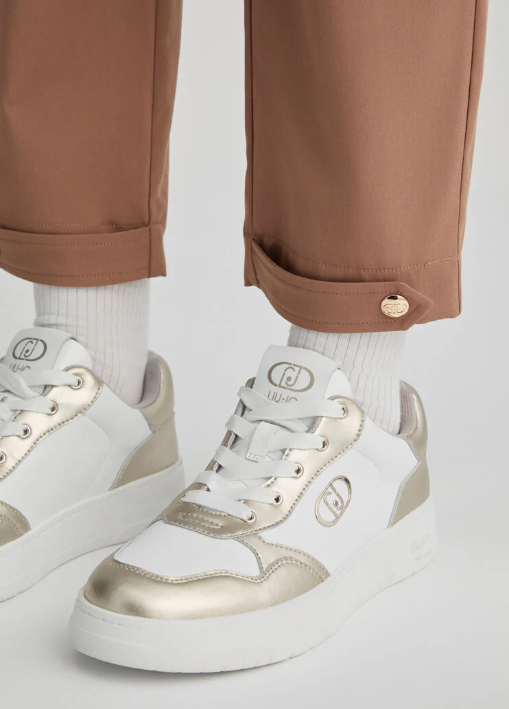 Cropped beige trousers