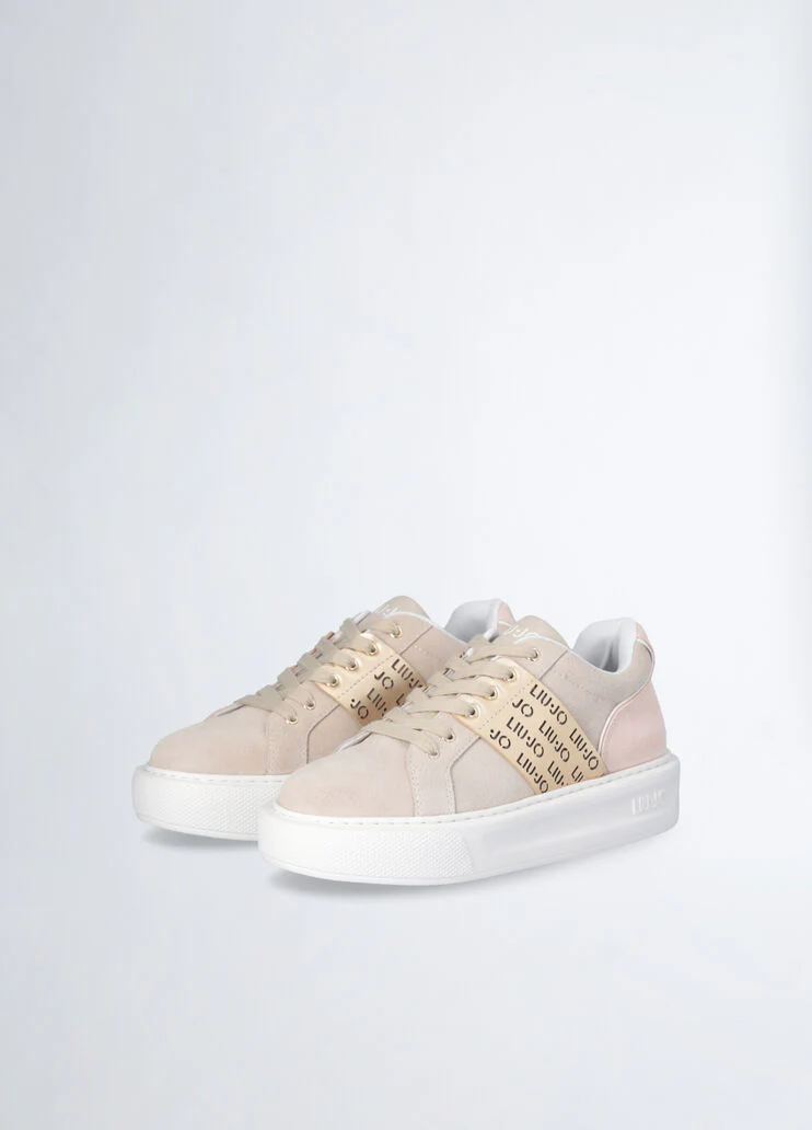 Sneakers with perforated logo