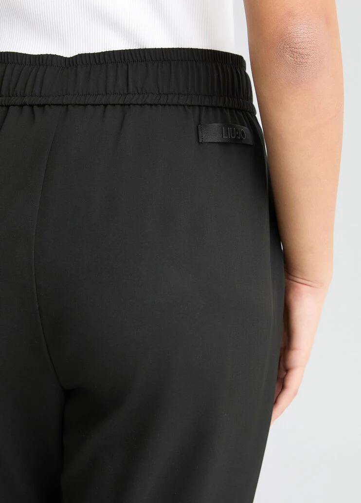 Cropped black trousers