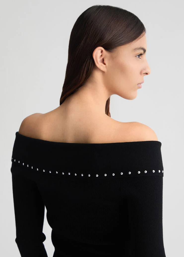 Top with zip and studs