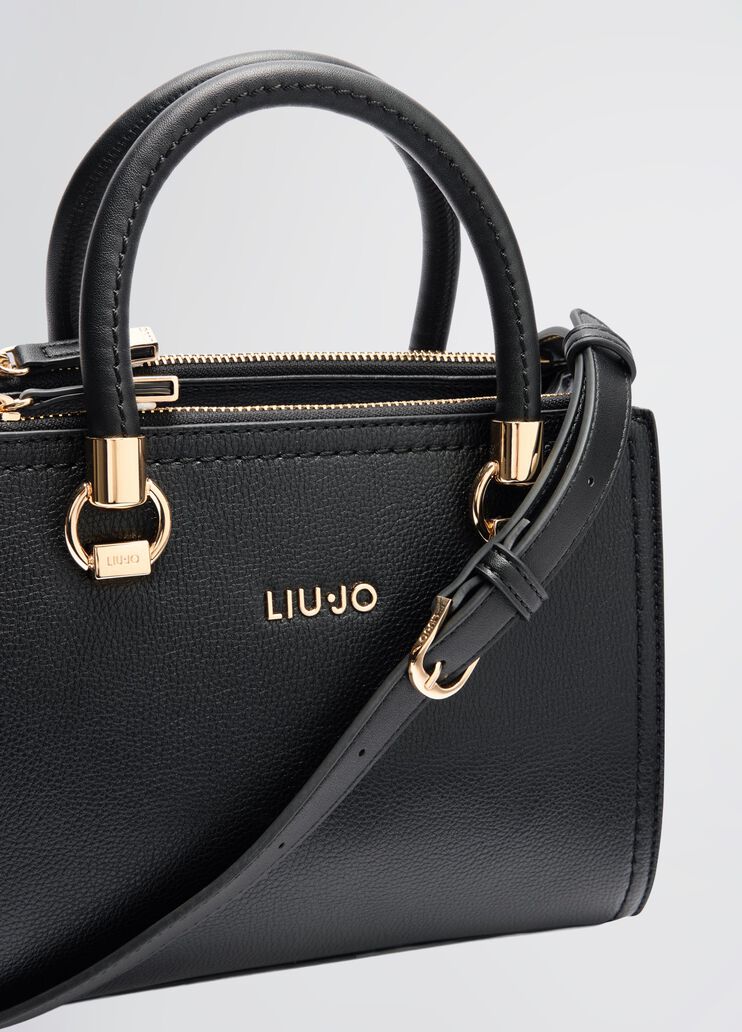 Handbag with matching clutch