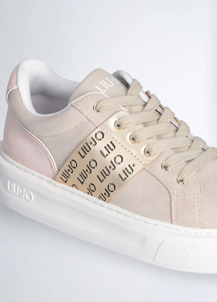 Sneakers with perforated logo