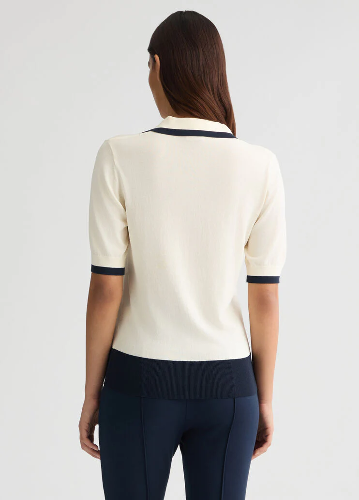 White jumper with details