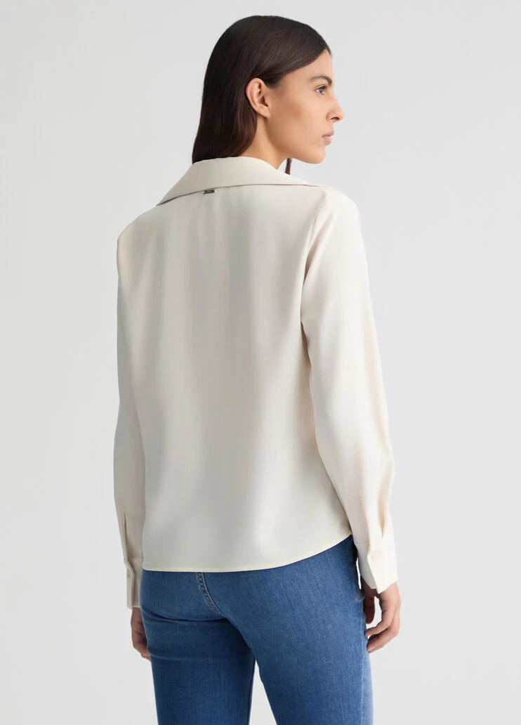 Blouse with gemstones