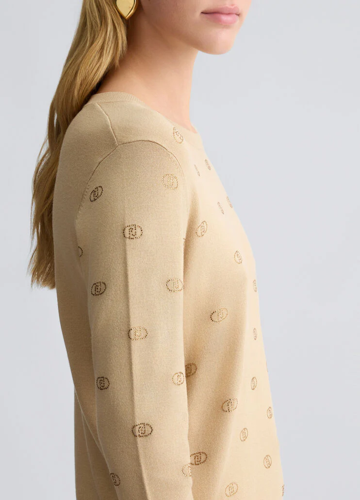 Top with logo and gemstones