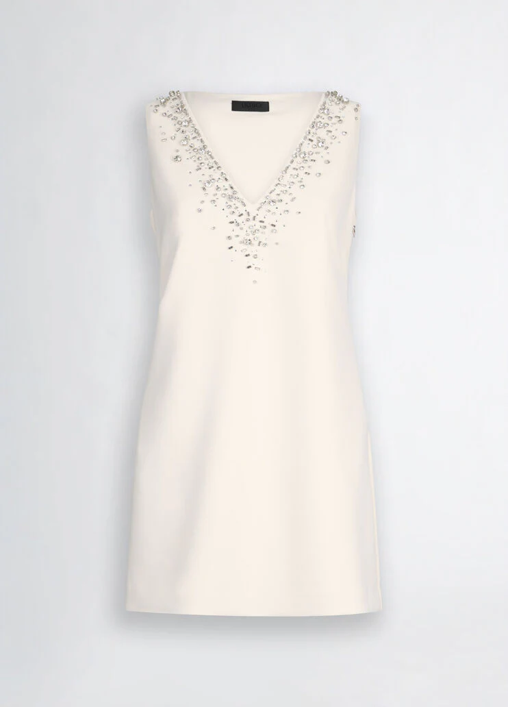 Short champagne-coloured dress with bejewelled embellishment