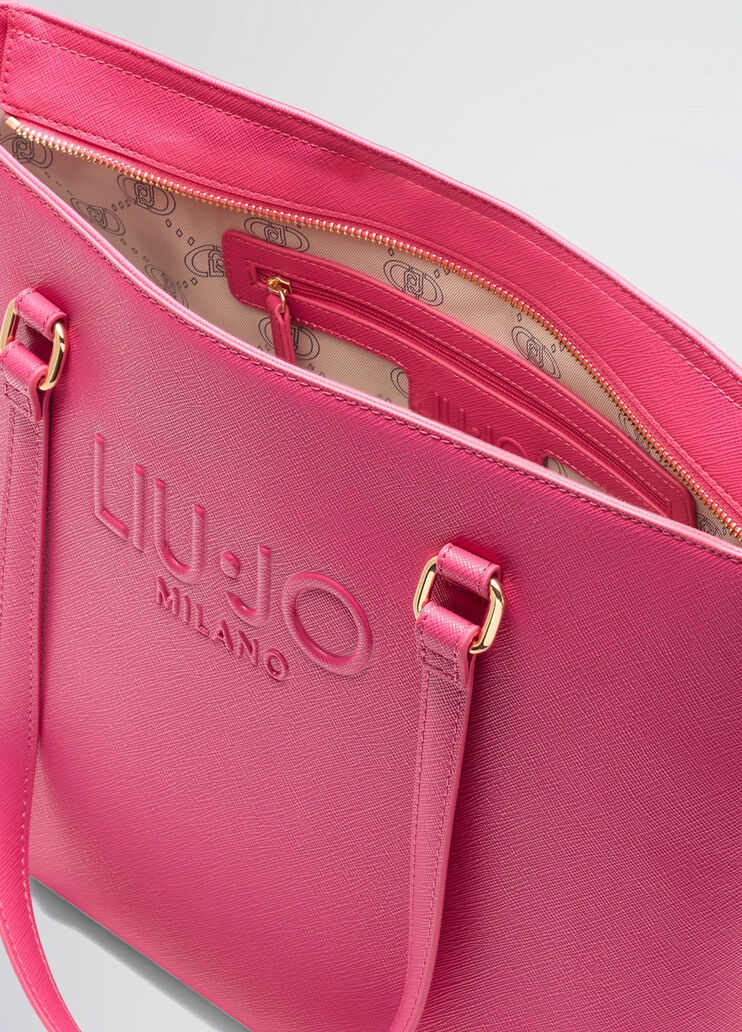 Bright pink shopping bag