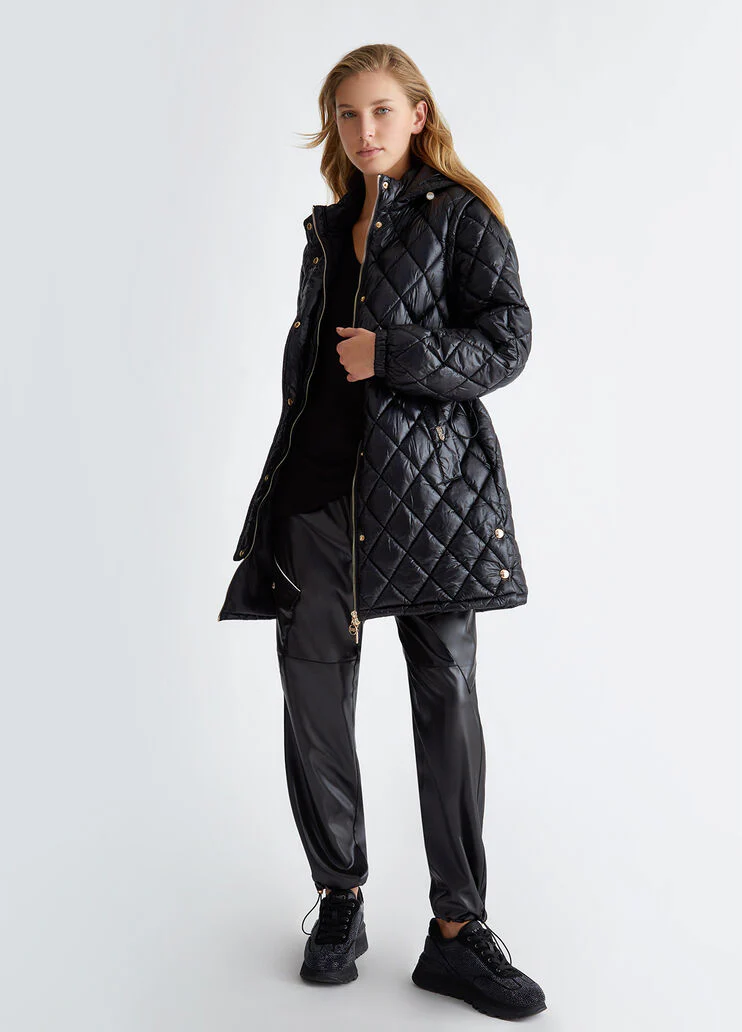 Padded jacket with detachable sleeves