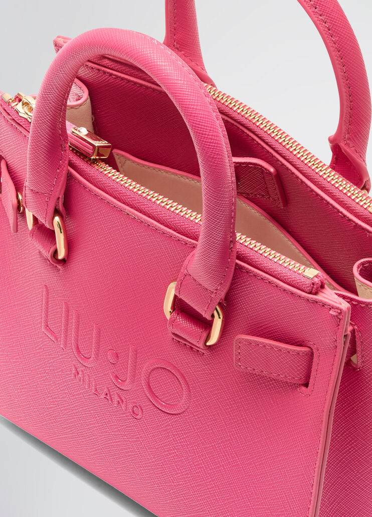 Bright pink handbag