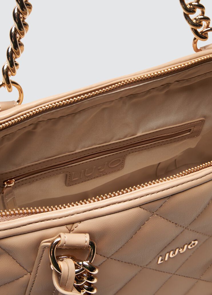 Quilted pink handbag