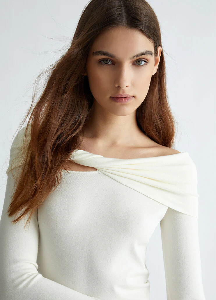 White body suit with cut-out