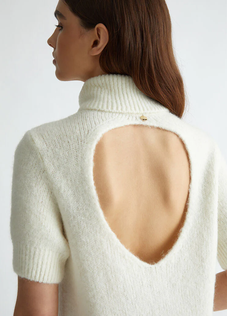 White turtleneck with cut-out